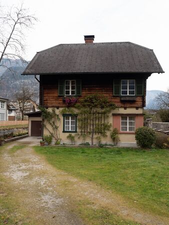 Hallstatt, Austria - November 2nd, 2018: House in Hallstatt decorated with espalier.のeditorial素材