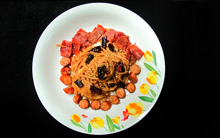 Homemade Stir-Fried Spaghetti With Dried Chili And sausage,hamの写真素材