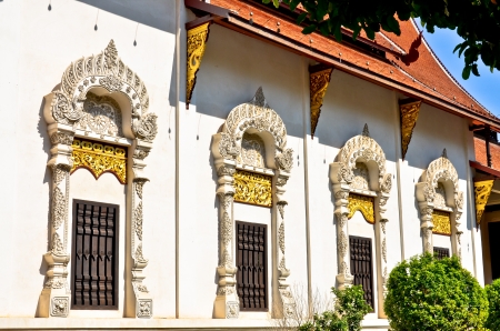 Thai style buddhism temple windowの写真素材