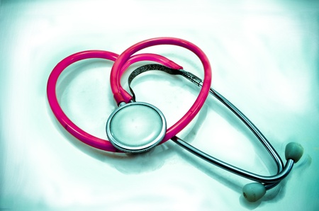 stethoscope in shape of heart, isolated on whiteの写真素材