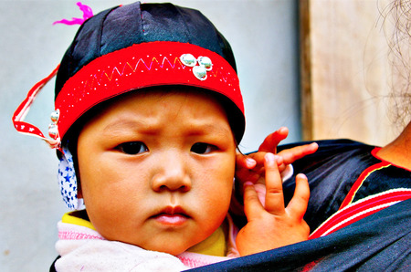 child in Hmong new year festival on January 15, 2013 in Chiang Mai, Thailand のeditorial素材