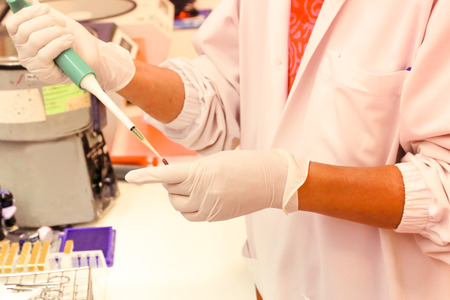 CHIANG MAI, THAILAND - JUNE 15, 2016:  experienced physicians in control room mixed blood test in multidisciplinary Clinic Centerのeditorial素材