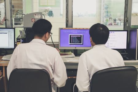 CHIANG MAI, THAILAND - JUNE 15, 2016: two experienced physicians in control room, in multidisciplinary Clinic Centerのeditorial素材
