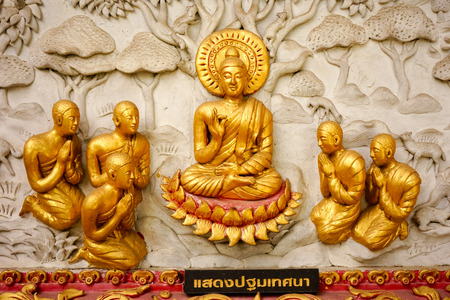Traditional Thai style art sculpture on temple's wallの写真素材