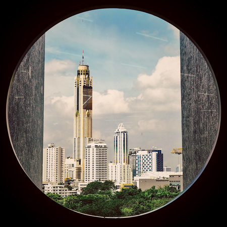 beautiful city view of Bangkok with blue sky from building windowの写真素材