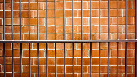 Old metal  on brick wallの写真素材