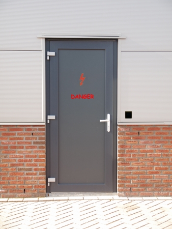 metal door with text danger and access control systemの写真素材
