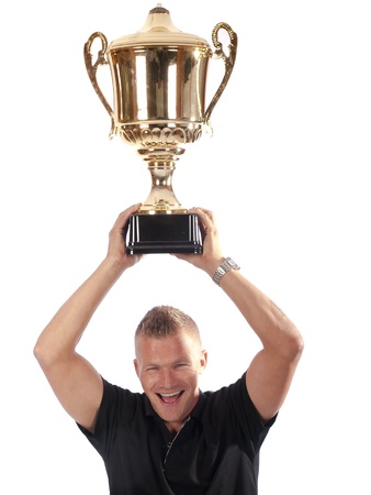 man hold a trophy cupの写真素材