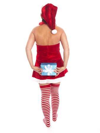 attractive woman with Santa Claus outfit and presentの写真素材