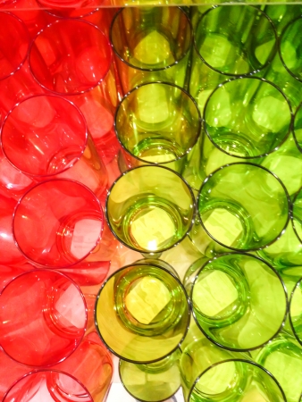 Red glass and green glass close upの写真素材
