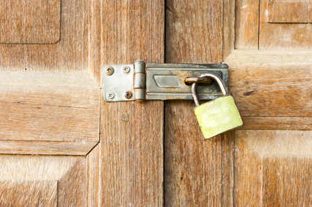 Locked wooden door,door of houseの写真素材