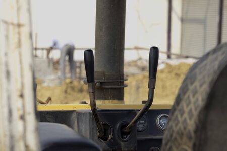 Hydraulics tractor Bulldozer on the sand,level the ground,Con struction of street.の写真素材
