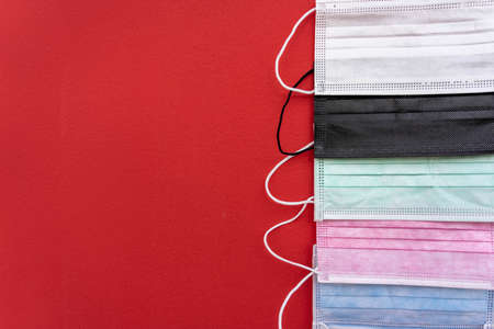 Colorful og Sugical Mask with red Background.の写真素材