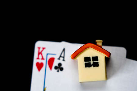 Loosing a house because of gambling.の写真素材