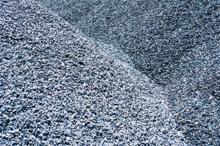 Grey and dark grey two tone. Gravel used to make concrete , to mix with asphalt , to create gravel road or gravel path , to create gravel floor and gravel graden. We bring them together in a gravel pine. gravel texture , gravel background and gravel isolated.の写真素材