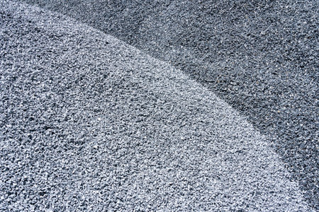 Grey and dark grey two tone. Gravel used to make concrete , to mix with asphalt , to create gravel road or gravel path , to create gravel floor and gravel graden. We bring them together in a gravel pine. gravel texture , gravel background and gravel isolated.の写真素材