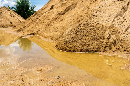 Coarse Sand pile and Find Granular Sand pile and fill Sand pile. used to make concrete  , to create  path , to create  floor. Sand texture , Sand  background and Sand isolated.の写真素材