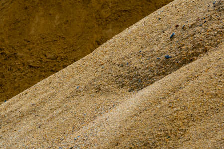 Coarse Sand pile and Find Granular Sand pile and fill Sand pile. used to make concrete  , to create  path , to create  floor. Sand texture , Sand  background and Sand isolated.の写真素材