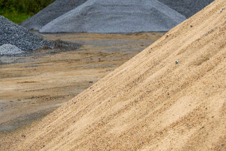 Coarse Sand pile and Find Granular Sand pile and fill Sand pile. used to make concrete  , to create  path , to create  floor. Sand texture , Sand  background and Sand isolated.の写真素材