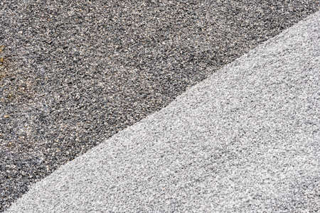 Grey and dark grey two tone. Gravel used to make concrete , to mix with asphalt , to create gravel road or gravel path , to create gravel floor and gravel graden. We bring them together in a gravel pine. gravel texture , gravel background and gravel isolated.の写真素材