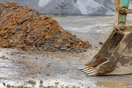 Hydraulic Excavator stopped working and and put the bucket on the ground.の写真素材