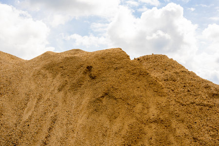 Coarse Sand pile and Find Granular Sand pile and fill Sand pile. used to make concrete  , to create  path , to create  floor. Sand texture , Sand  background and Sand isolated.の写真素材