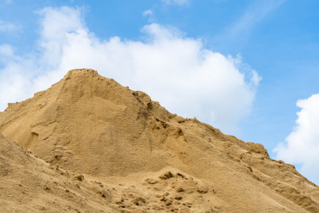 Coarse Sand pile and Find Granular Sand pile and fill Sand pile. used to make concrete  , to create  path , to create  floor. Sand texture , Sand  background and Sand isolated.の写真素材