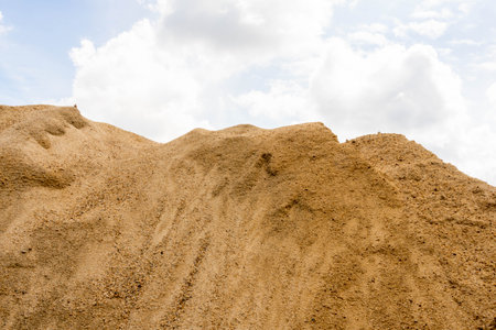 Coarse Sand pile and Find Granular Sand pile and fill Sand pile. used to make concrete  , to create  path , to create  floor. Sand texture , Sand  background and Sand isolated.の写真素材