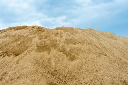 Coarse Sand pile and Find Granular Sand pile and fill Sand pile. used to make concrete  , to create  path , to create  floor. Sand texture , Sand  background and Sand isolated.の写真素材