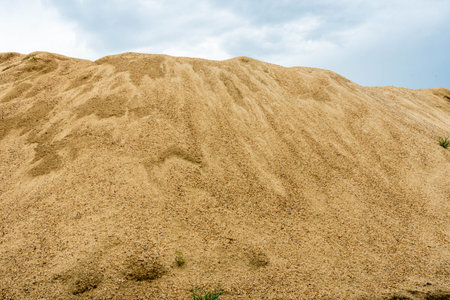 Coarse Sand pile and Find Granular Sand pile and fill Sand pile. used to make concrete  , to create  path , to create  floor. Sand texture , Sand  background and Sand isolated.の写真素材