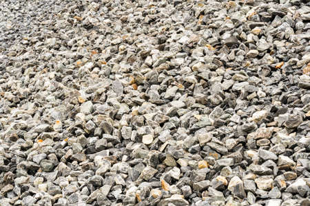 Gravel used to make concrete , to mix with asphalt , to create gravel road or gravel path , to create gravel floor and gravel graden. We bring them together in a gravel pine. gravel texture , gravel background and gravel isolated.の写真素材