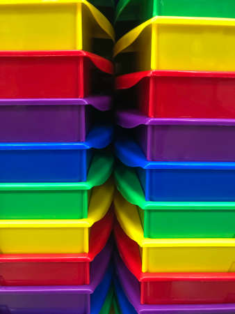 The sides of the plastic crates are stacked on top of each other.の写真素材