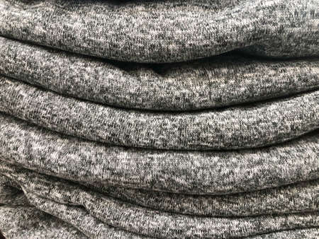 Putting Clothes in to the wardrobe / closet.の写真素材