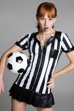 Female Referee Blowing Whistleの写真素材