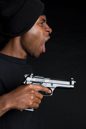 Angry Man Holding Gunの写真素材