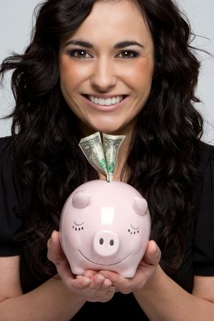 Girl Holding Piggy Bank