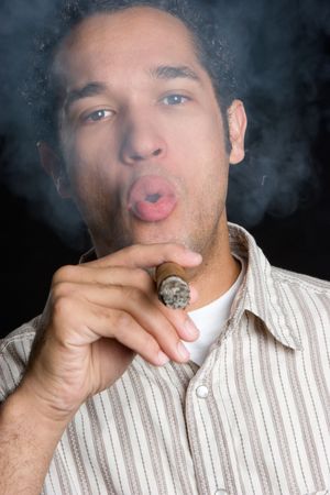 Man Blowing Cigar Smoke