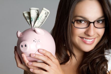 Woman Holding Piggy Bankの写真素材