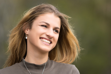 Pretty laughing teenage girl portraitの写真素材