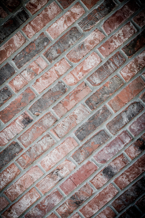 Diagonal grunge brick wall background