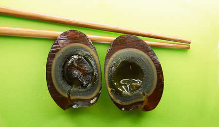 Traditional asian cuisine - Thousand year old eggs. Its something awful for European person. の写真素材