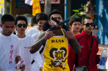 Phuket Vegetarian Festival. Shocking asian tradition - body piercing.