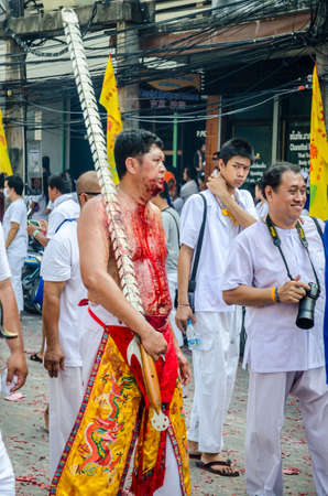 Phuket Vegetarian Festival. Shocking asian tradition - body piercing.のeditorial素材