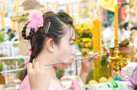 Phuket Vegetarian Festival. Shocking asian tradition - body piercing.のeditorial素材