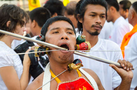 Phuket Vegetarian Festival. Shocking asian tradition - body piercing.のeditorial素材