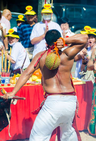 Phuket Vegetarian Festival. Shocking asian tradition - body piercing.のeditorial素材