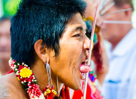 Phuket Vegetarian Festival. Shocking asian tradition - body piercing.のeditorial素材
