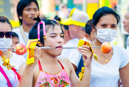 Phuket Vegetarian Festival. Shocking asian tradition - body piercing.のeditorial素材