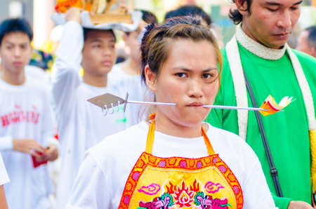 Phuket Vegetarian Festival. Shocking asian tradition - body piercing.のeditorial素材