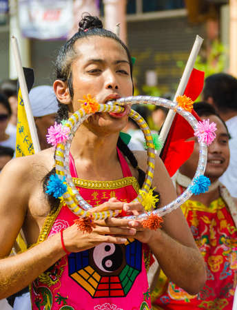 Phuket Vegetarian Festival. Shocking asian tradition - body piercing.のeditorial素材